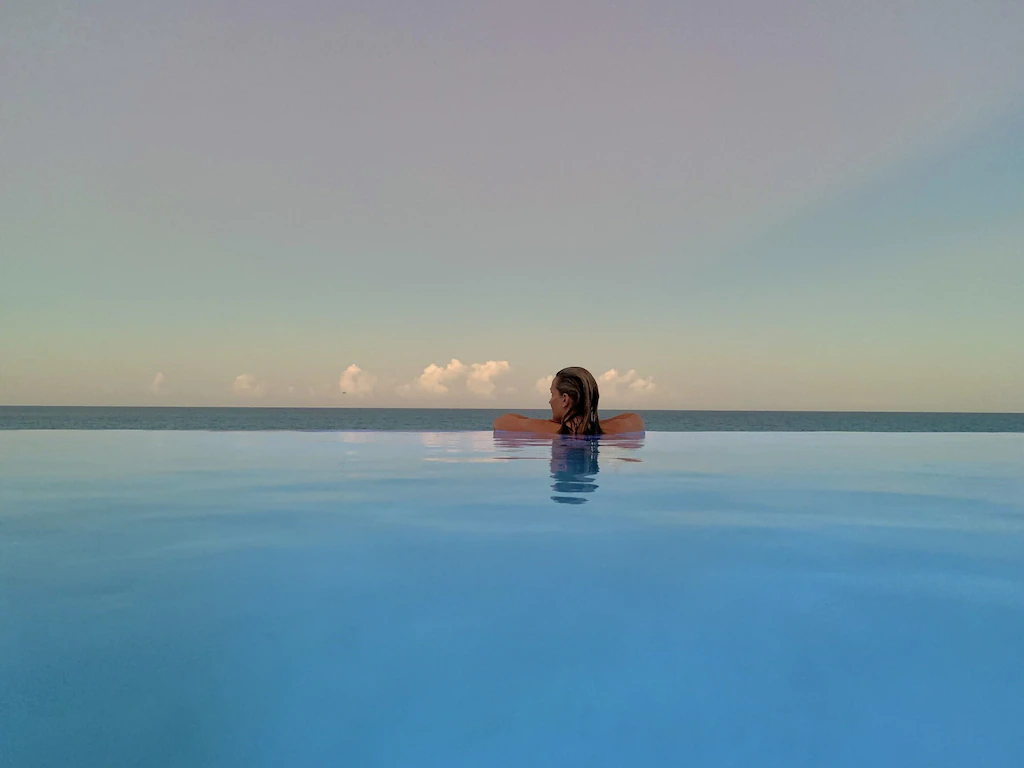 Pool deck overlooking the ocean at Beau Soleil Beach House
